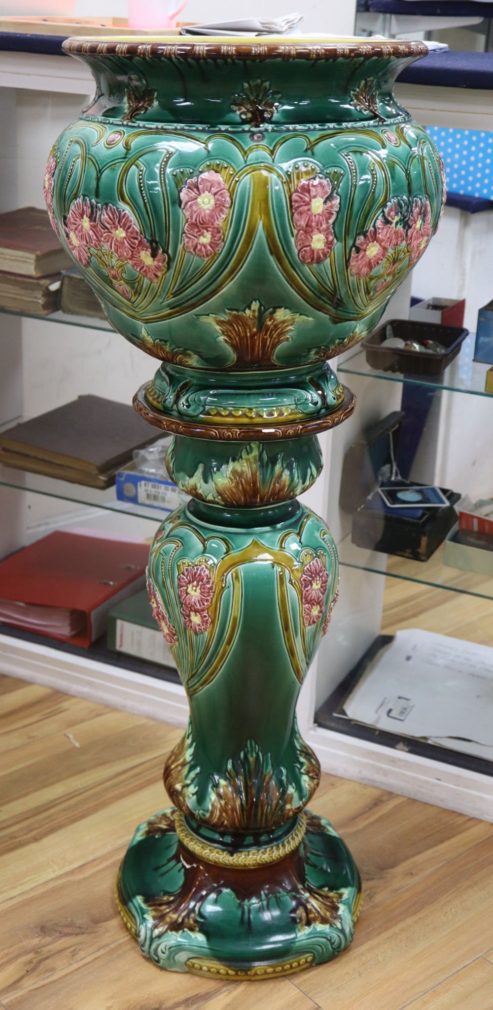 A majolica jardiniere on stand, height 115cm
